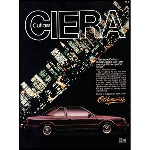 1986 Oldsmobile Cutlass Ciera Sedan Vintage Print Ad City Skyline Night Wall Art